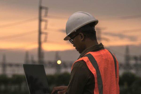 engineer holding his laptop